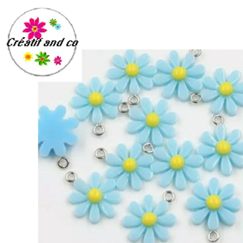Pendentif fleur bleue coeur jaune résine 20mm