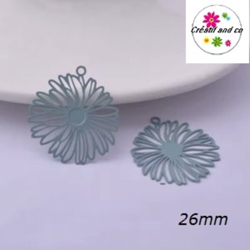 Breloque estampe fleur bleue claire 26mm