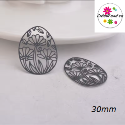 Breloque estampe ovale forme fleur de lotus noire 30mm