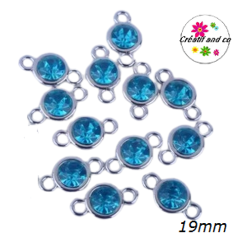 Connecteur acrylique et strass turquoise 19mm