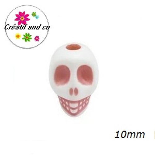 X10 perles tête de mort blanche/rose 10mm