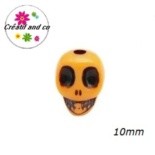 X10 perles tête de mort orange flashy 10mm