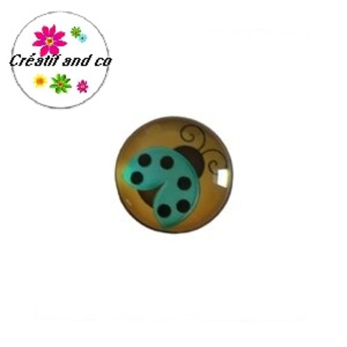 Bouton pression coccinelle bleue