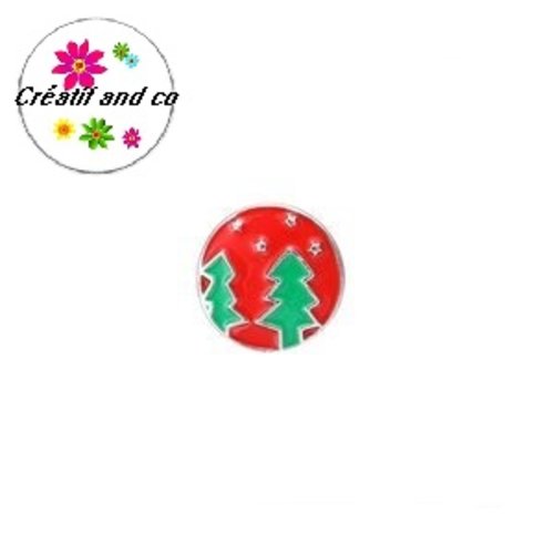 Bouton pression sapin vert fond rouge métal