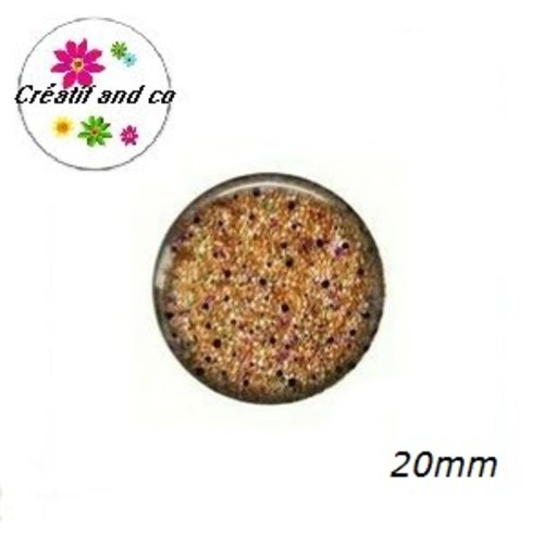 Cabochon doré point noir 20mm