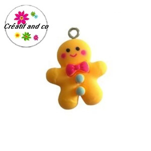 Breloque mr pain d'épice de noël jaune résine