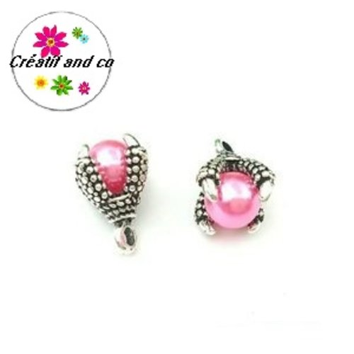 Pendentif griffe de dragon et sa perle nacré fuchsia