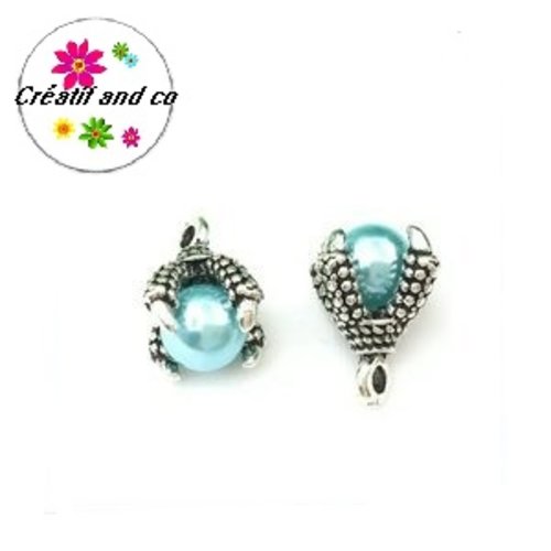 Pendentif griffe de dragon et sa perle bleu clair