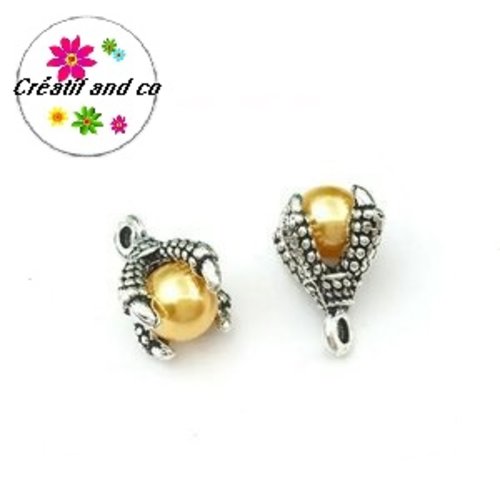Pendentif griffe de dragon et sa perle jaune d'or