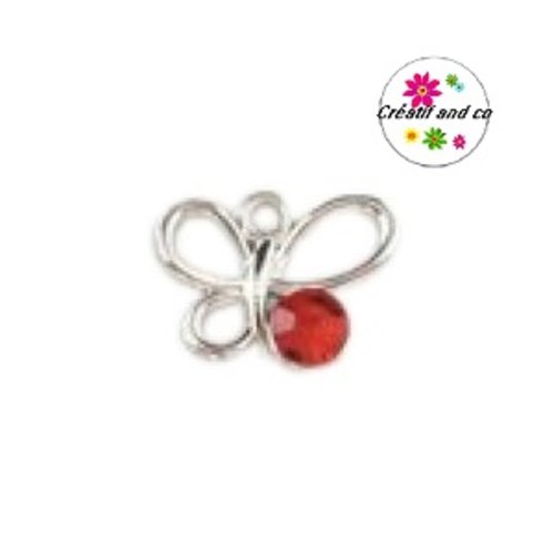 Papillon acrylique et strass rouge