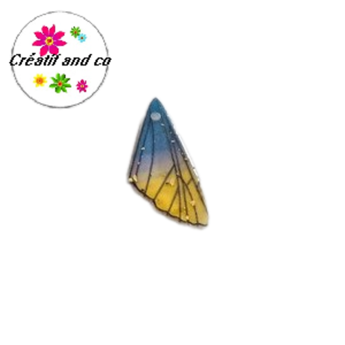 Breloque aile de papillon résine