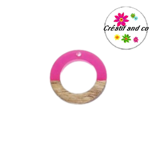 Pendentif rond creux bois et résine fuschia translucide  25mm