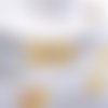 Breloque estampe fleur jaune  29mm