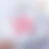 Breloque estampe forme feuille ronde rose flashy 16mm