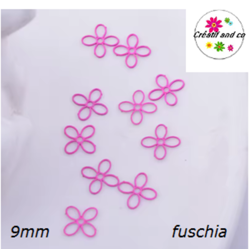Breloque estampe petite fleur fuschia 9mm