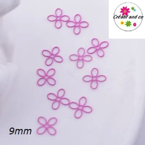 Breloque estampe petite fleur fuschia 9mm
