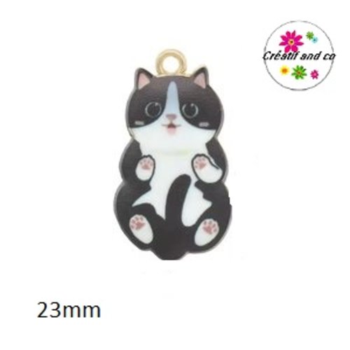 Breloque chat noir et blanc allongé sur le dos 23mm
