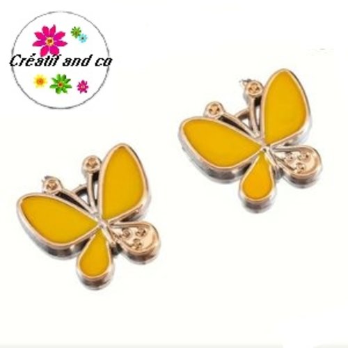 Breloque papillon jaune résine 17mm