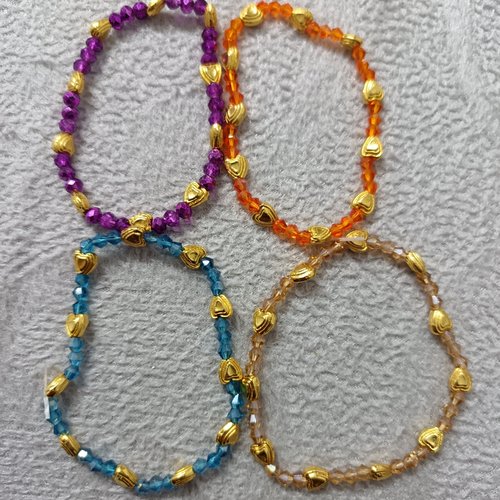 Bracelet en perles cœurs métallique doré