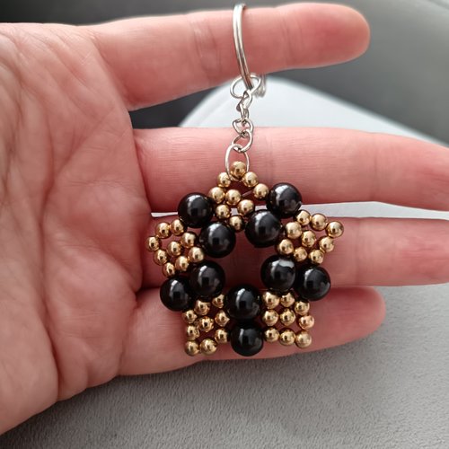 Porte-clés étoile en perles noir et or fait main, bijou de sac artisanal élégant