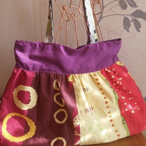 Sac de forme ronde porté épaule réversible