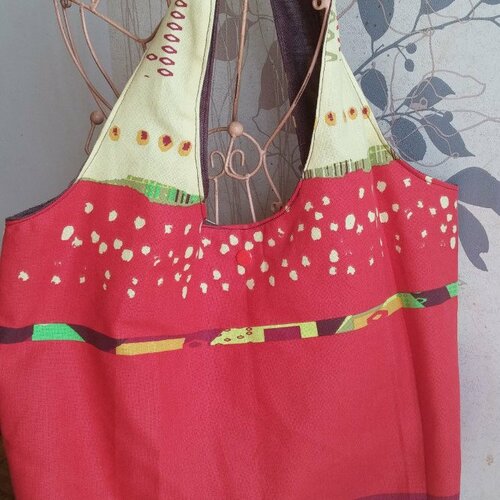 Sac de forme ronde porté épaule
