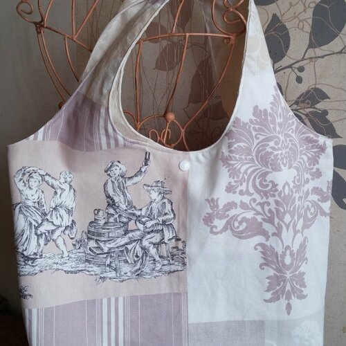Sac de forme ronde porté épaule