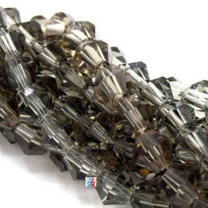 Chapelet de 118 perles en verre à facettes toupie 4mm ab vert