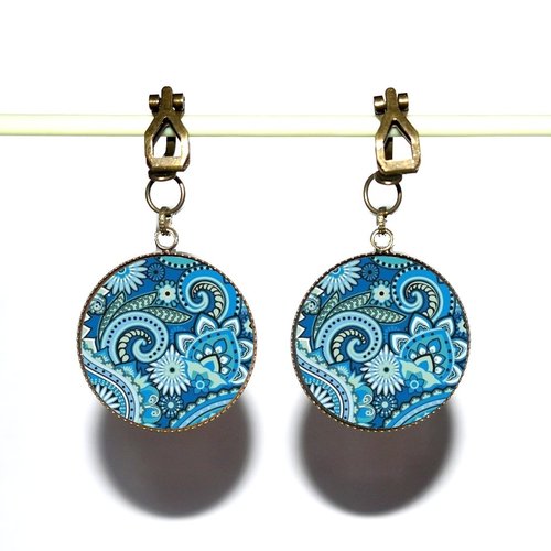 Clips d’oreilles bronze avec cabochons en résine * spirales bleues *