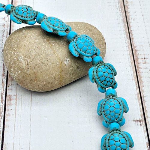 23 perles tortue en turquoise synthétique