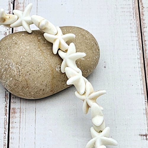 36 perles étoile de mer blanches 14mm
