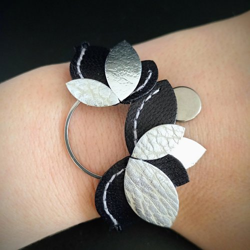 Bracelet "aurore" en cuir noir et argenté, bracelet réglable en acier inoxydable et feuillage en cuir fait à la main.