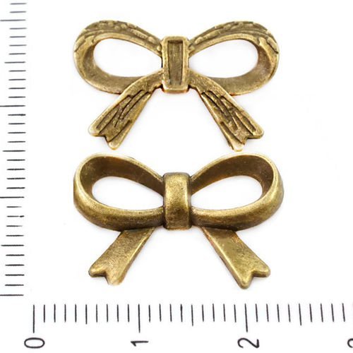 4pcs bronze antique ton arc noeud pendentifs charms bowknot tchèque métal conclusions 21mm x 14mm sku-39258