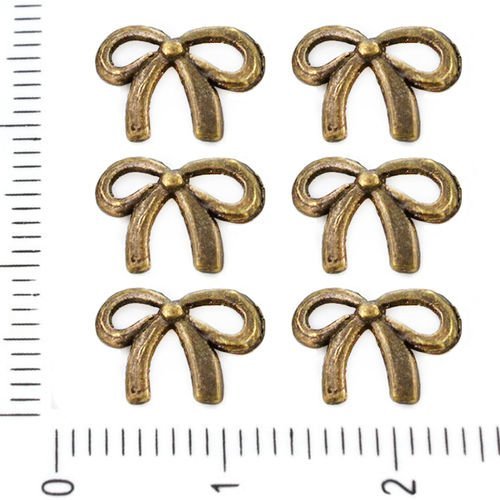 8pcs bronze antique ton arc noeud pendentifs bowknot charmes tchèque métal conclusions 11mm x 8mm sku-39270