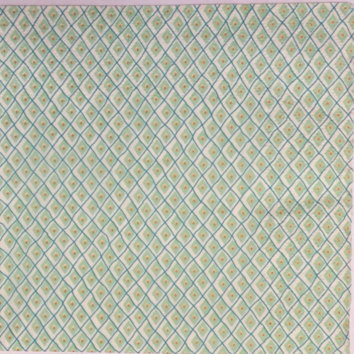 Serviette en papier motif graphique et géométrique losanges vert amande et bleu sur fond blanc 