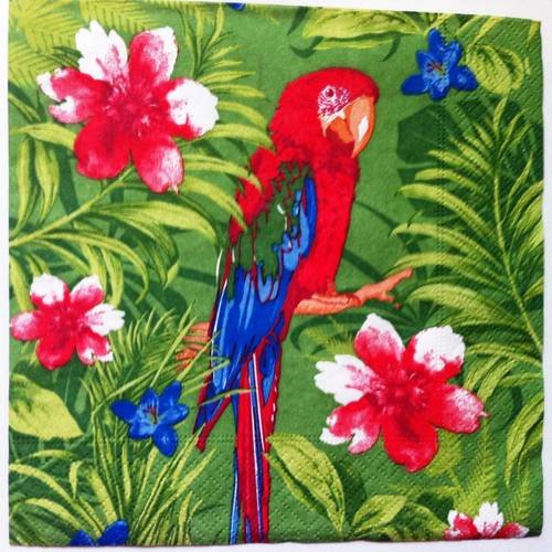 Serviette en papier motif pimpant perroquet rouge et bleu sur fond de verdure 