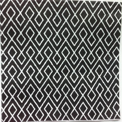 Serviette en papier motif graphique et géométrique losanges blancs sur fond noir 
