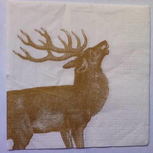 Serviette en papier motif imprimé renne doré sur fond blanc 