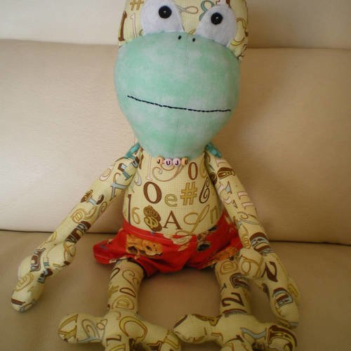 Doudou grenouille en tissu patchwork multicolore