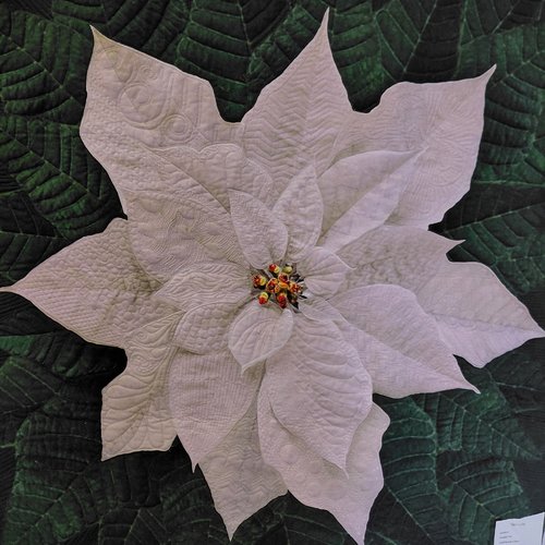 Panneau quilté représentant un poinsettia de robert kaufman
