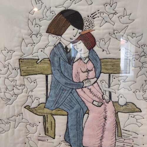 Tableau en tissu représentant les amoureux de peynet
