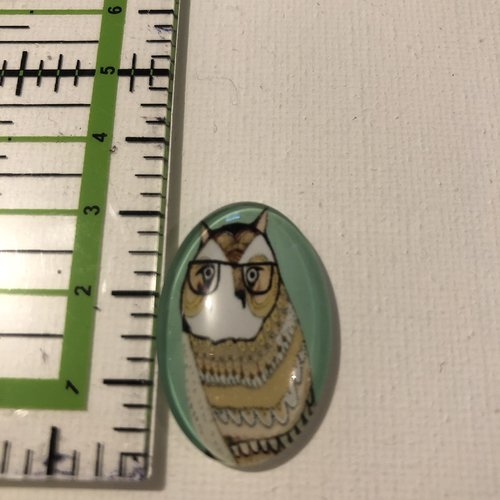 Cabochon en résine à motifs