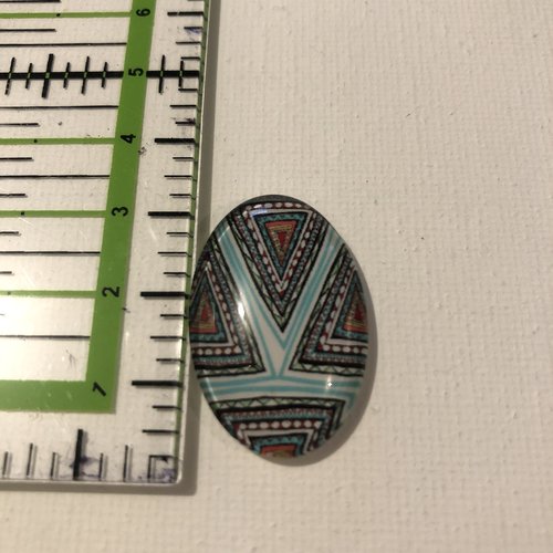 Cabochon en résine à motifs