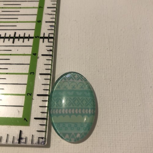 Cabochon en résine à motifs