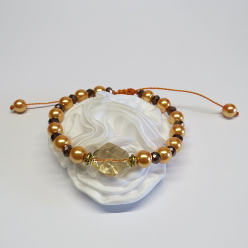 Bracelet micro-macramé perles de verres nacré orangé perle à facette pêche et cuivré.