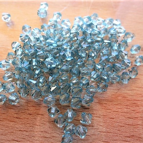 100 perles toupies acrylique bleu-vert translucide 4 mm