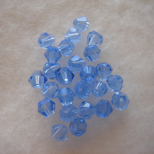 25 perles toupies 4 mm cristal bleu ciel