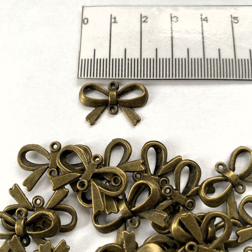 Perle connecteur métal bronze forme noeud 14 x 21 mm motifs géométriques