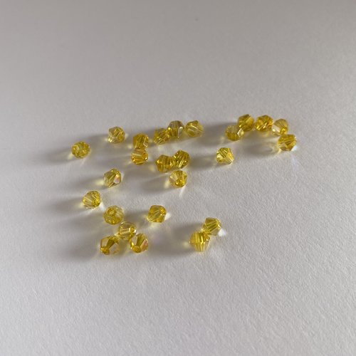 25 perles toupies cristal jaune  ab 4 mm