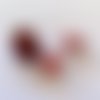 3 perles verre tons rouge et transparents formes et tailles différentes
